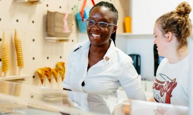 Ajoah Mintah behind counter at Four all Ice Cream