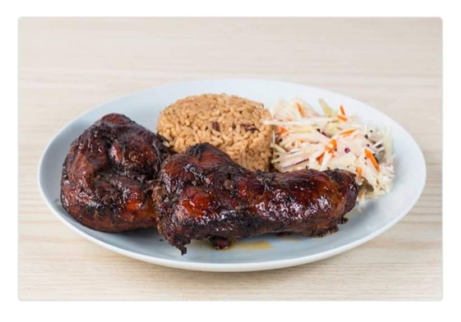 Jerk chicken, rice and peas with a side of coleslaw