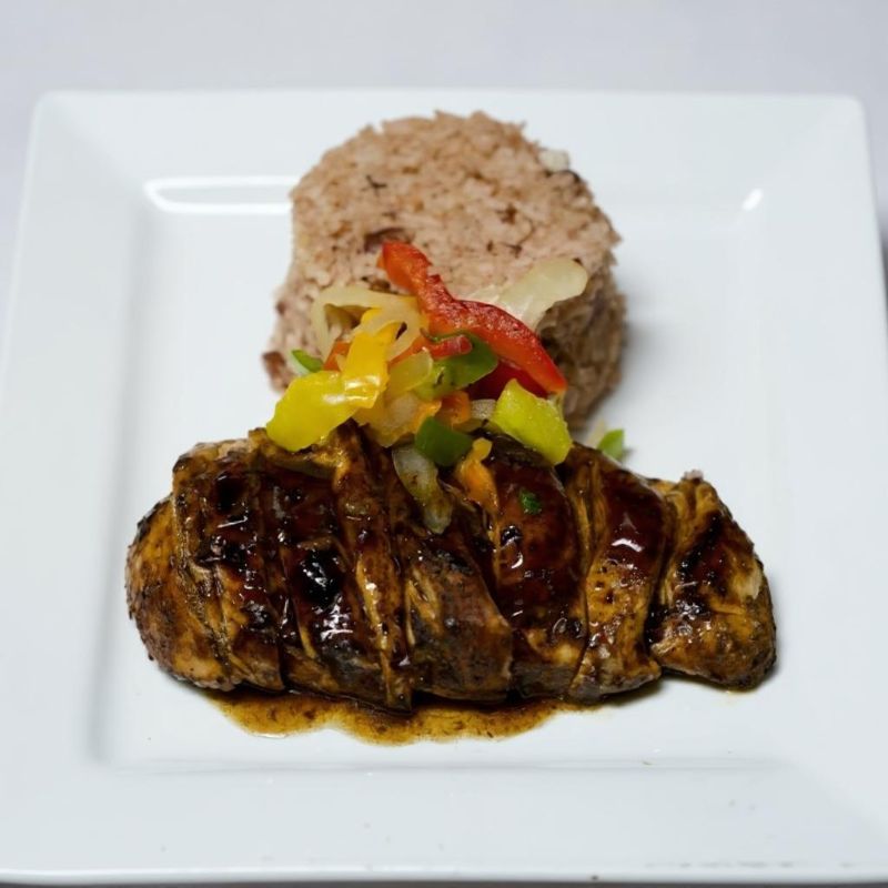 jerk chicken breast with vegetables and rice