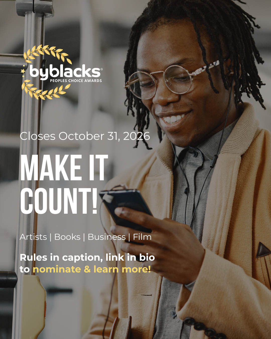 A promotional graphic for the ByBlacks People’s Choice Awards overlays a portrait-oriented photograph. On the right, a smiling Black person with long locs and round glasses looks down at a smartphone. They wear a tan textured jacket over a gray shirt and stand beside a reflective metal door or elevator frame. On the left, a gold laurel wreath surrounds the white “byblacks” logo. White and gold text appears over the lower-left portion of the image, announcing the nomination deadline and award categories.