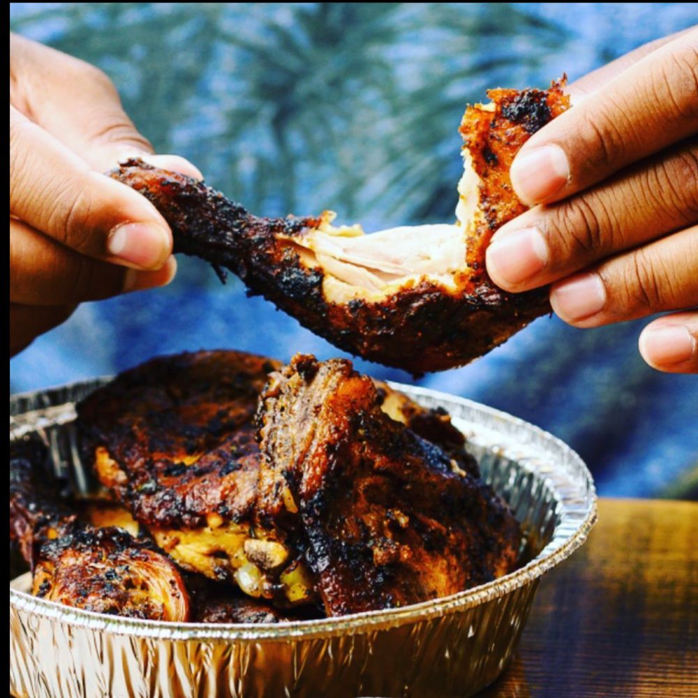Jerk chicken in in aluminum tray