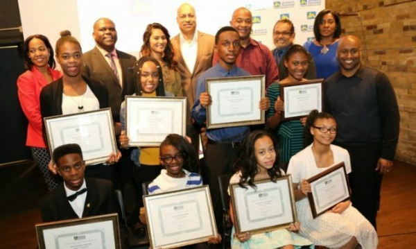 The winners and sponsors of the Jamaica National Building Society Black History Month Essay Competition