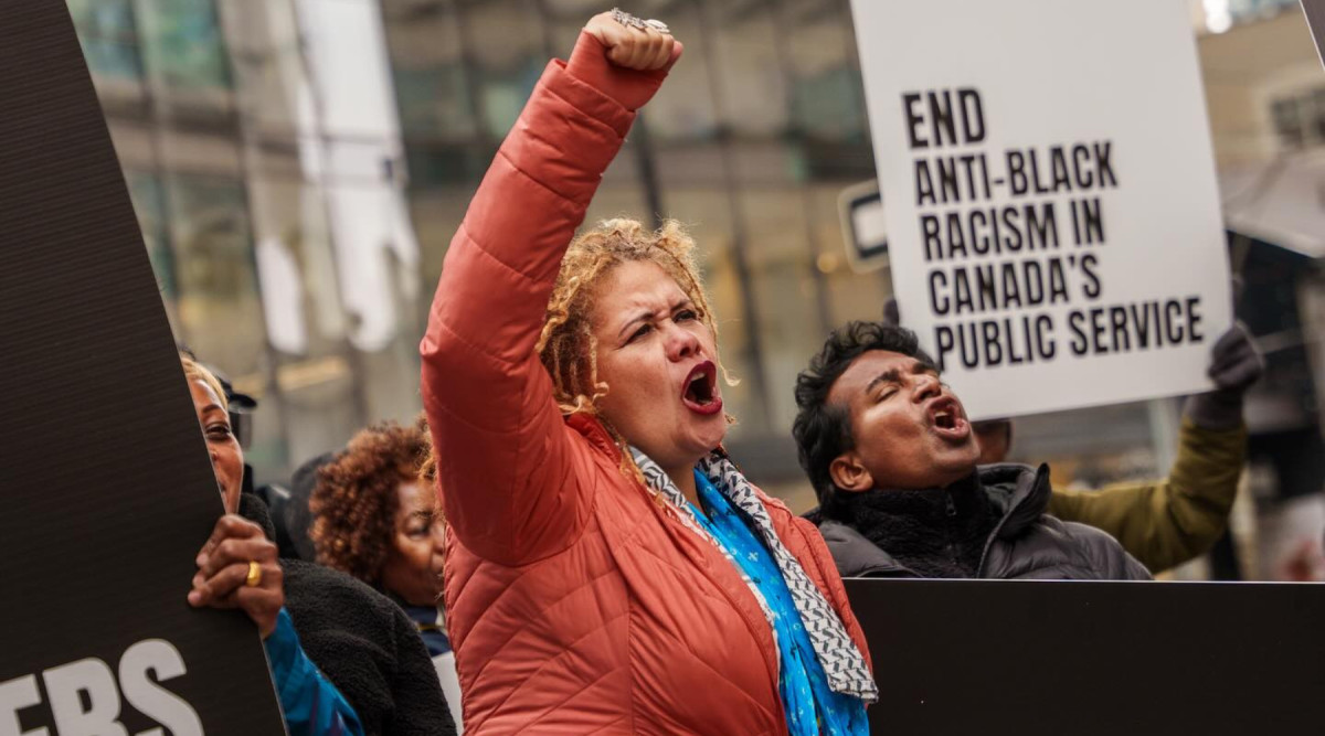 A rally outside a federal court in Toronto on Oct. 28 2024 when the certification hearing began for the proposed Black Class Action lawsuit.