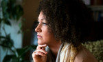 In this March 2, 2015, file photo, Rachel Dolezal, president of the Spokane chapter of the NAACP, poses for a photo in her Spokane, Wash., home. Dolezal resigned Monday, June 15, 2015, amid a furor over racial identity that erupted when her parents came forward to say she has been posing as black for years when she is actually white. (Colin Mulvany/The Spokesman-Review via AP, File)
